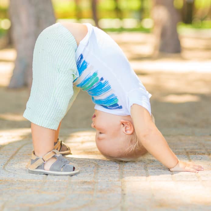 Baby doing yoga exercises